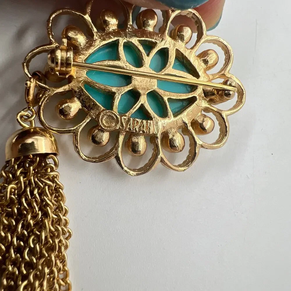 Sarah Coventry Magic Moods Faux Turquoise Brooch Gold Tone Chain Tassel 1973